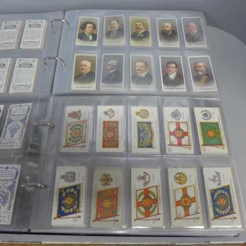 739 - Two albums of Wills and other cigarette cards; famous people, Army equipment, military honours with ... 