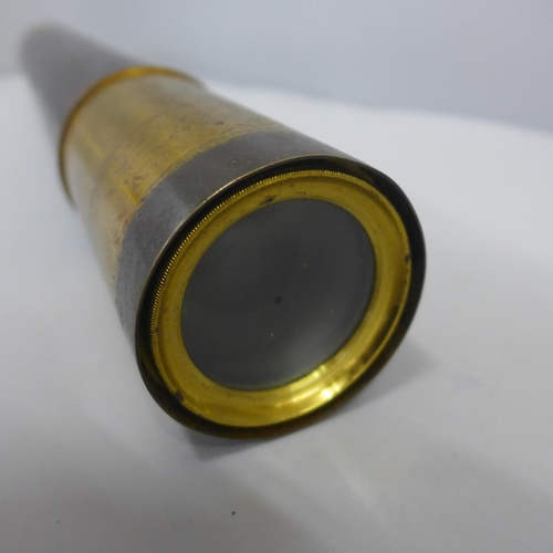 765 - A brass and leather covered telescope, marked Stebbing, Southampton