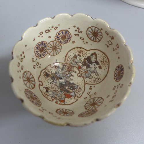 780 - A 19th Century Satsuma bowl with scallop edge rim, elaborately decorated inside and out with figures... 