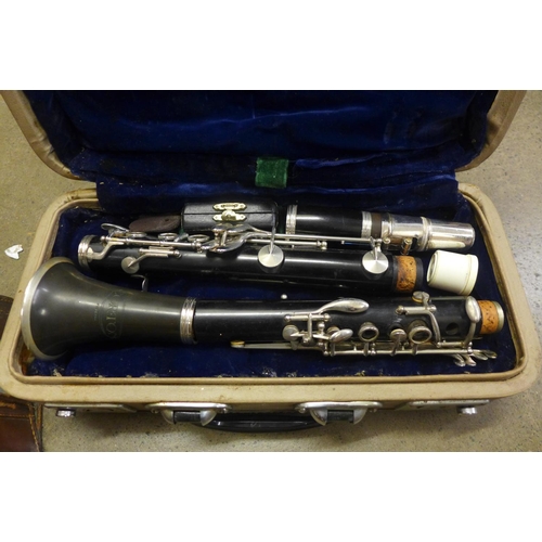 789 - A Corton clarinet, cased, and a Jerome-Thibouville Lamy clarinet, Thibouville lacking reed holder, w... 