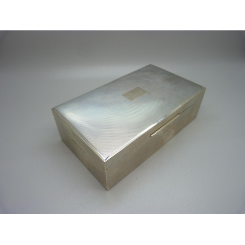 802 - An Art Deco style silver cigarette box with wood lining, 518g gross