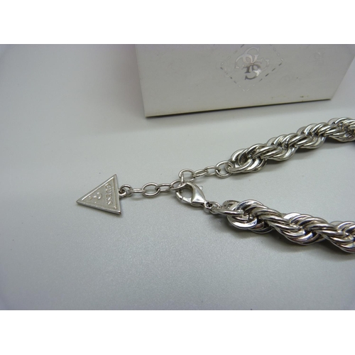 808 - A Guess bracelet, boxed