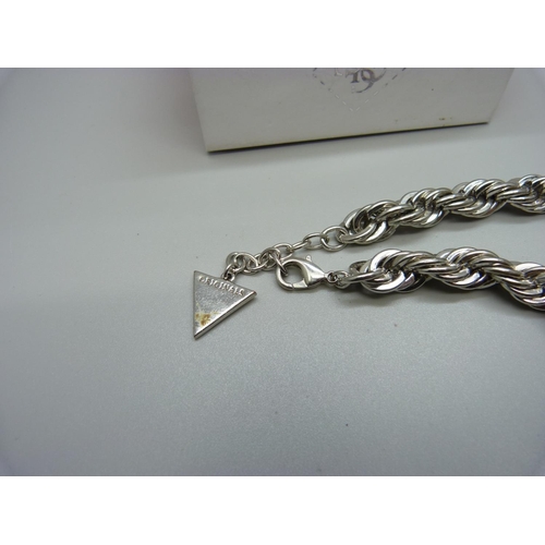 808 - A Guess bracelet, boxed