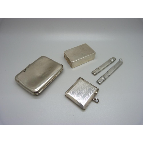 813 - A silver vesta case with personalised engraving, matchbox holder and two silver pencils and chrome c... 