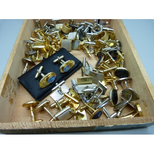 816 - Approximately thirty-eight pairs of cufflinks including opal