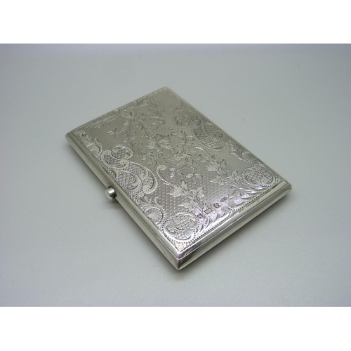 821 - A silver card case, with engine turned and engraved foliate decoration, Birmingham 1901, leather lin... 