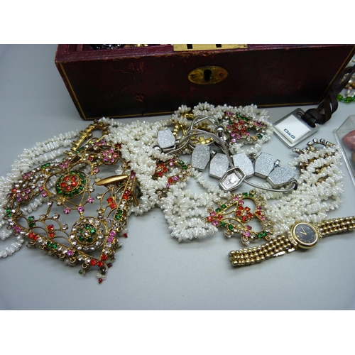 852 - Costume jewellery and gemstone pendants in a vintage jewellery box