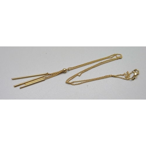 868 - A 9ct gold pendant and chain and a pair of similar earrings, 4.7g