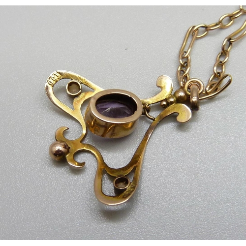 869 - A vintage Art Nouveau 9ct gold, amethyst and seed pearl pendant and chain, 6.7g