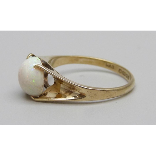 872 - A 9ct gold, opal solitaire ring, 1.5g, N