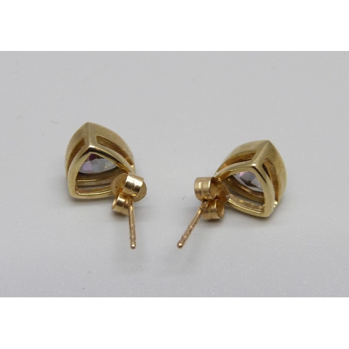 875 - A pair of 9ct gold and mystic topaz ear studs, 2.5g