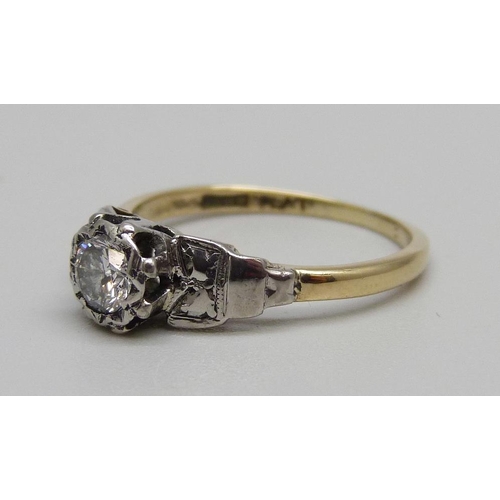 878 - An 18ct gold, platinum and diamond solitaire ring, 2.2g, L