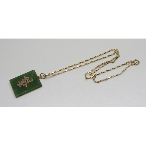 888 - A 9ct gold and jade pendant and chain, chain 2.0g