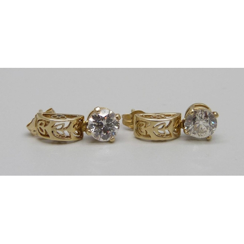 891 - A pair of 9ct gold and diamond ear studs, approximately 1.15ct diamond weight