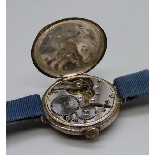 897 - A silver trench watch marked Invincible, London import mark, 1926