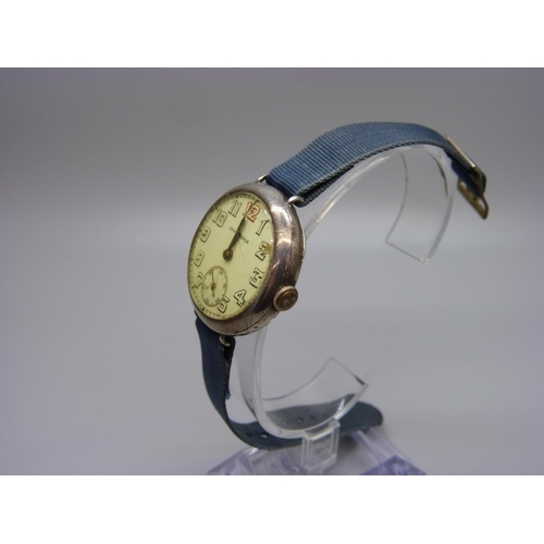 897 - A silver trench watch marked Invincible, London import mark, 1926