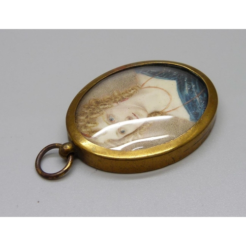 908 - A 19th Century oval watercolour miniature of a young lady