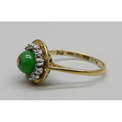 928 - An 18ct gold, jade and white stone ring, 3.2g, M