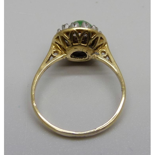 928 - An 18ct gold, jade and white stone ring, 3.2g, M