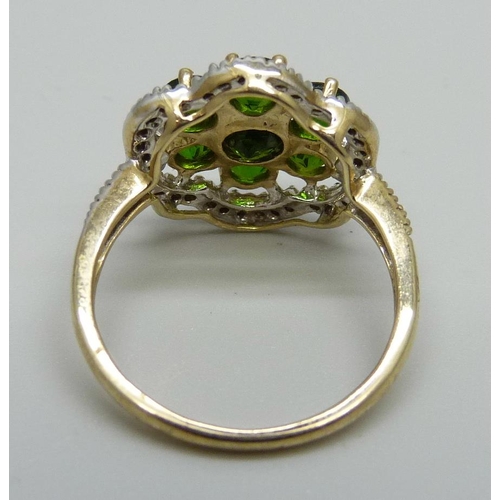 929 - A 9ct gold, green diopside and thirty-eight stone diamond ring, 3.8g, P