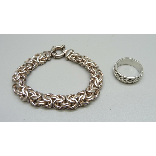 936 - A heavy silver bracelet and a ring, T, 37g