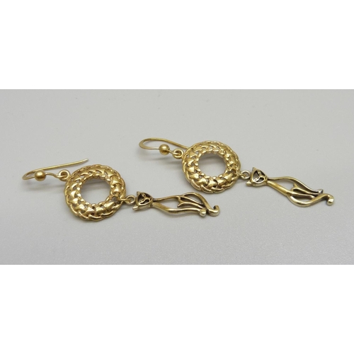 938 - A pair of silver gilt Celtic style drop earrings