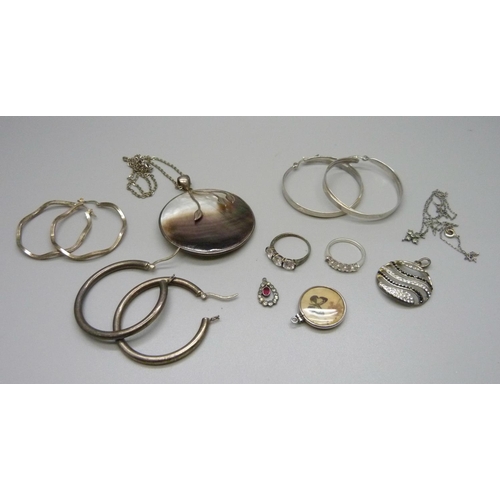 939 - Silver jewellery, rings, earrings and pendants and chains, 71g