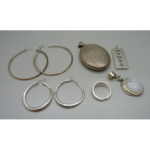 941 - Silver jewellery including ingot, large locket, pendant and earrings, 115g