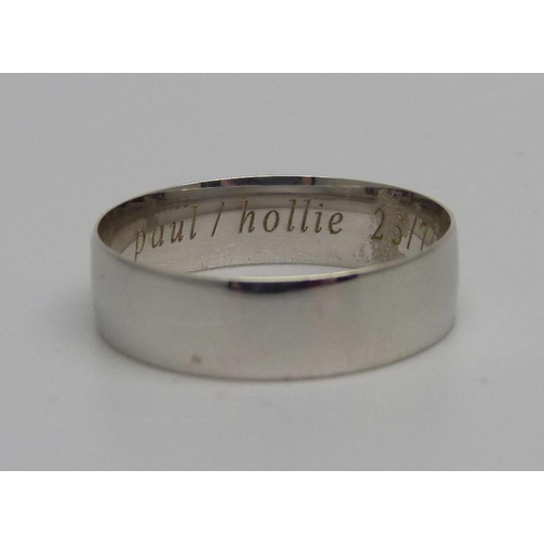 959 - A 9ct white gold wedding band, engraved on the shank, Paul/Hollie 23/7/22, 2.8g, U