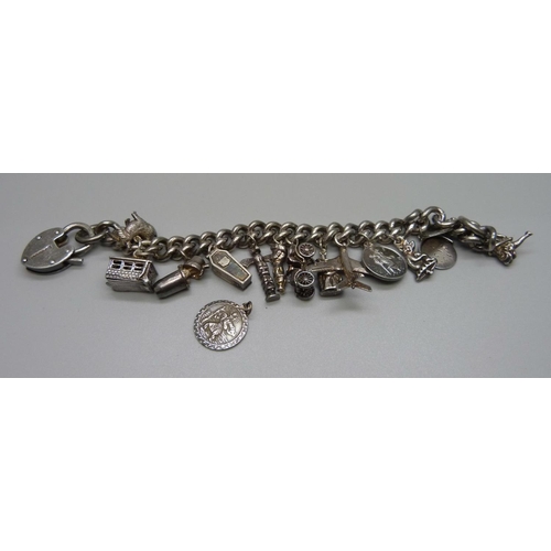 972 - A silver charm bracelet, 87g