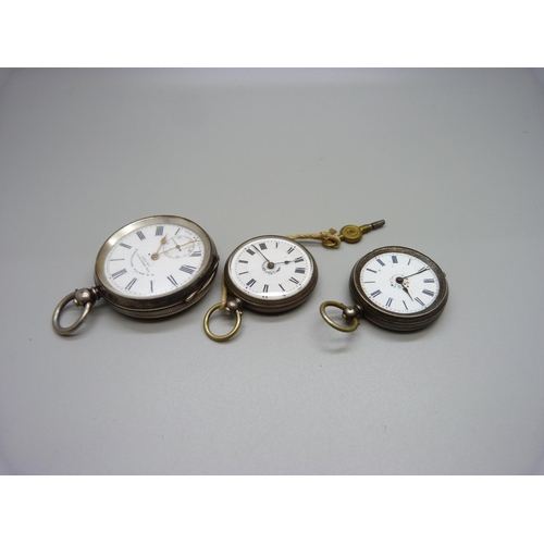 976 - A silver pocket watch and two silver fob watches, one lacking glass