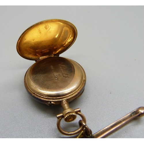 982 - A yellow metal pendant watch on a 9ct gold bar brooch, gross weight 21g