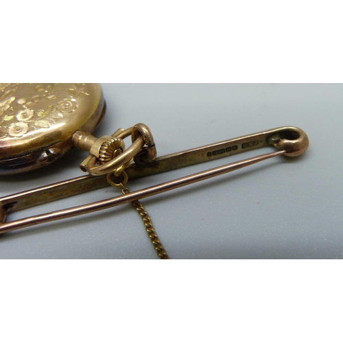 982 - A yellow metal pendant watch on a 9ct gold bar brooch, gross weight 21g