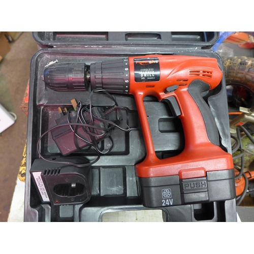 2037 - Powerdevil cordless 24V hammer drill with battery and charger in case - W