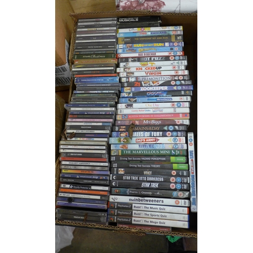 2052 - box of approx. 70 dvds and cd’s and Ps2 games