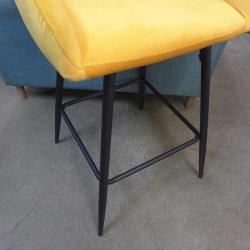 1336 - A mustard velvet bar stool