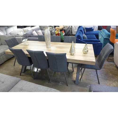 1431 - A Matton 2mtr dining table and eight Tamar chairs