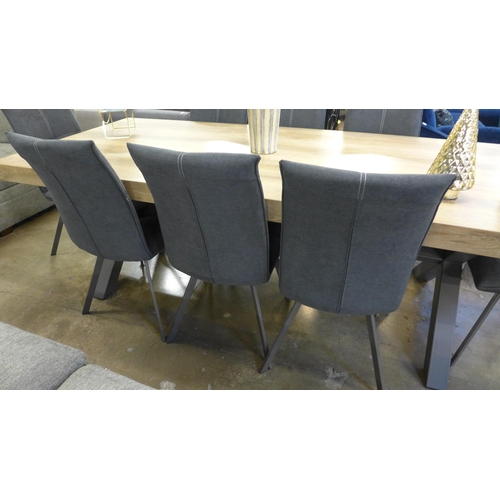 1431 - A Matton 2mtr dining table and eight Tamar chairs