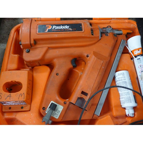 2102 - Cordless Paslode IM350/90CT nail gun complete with charger, two batteries, 4 boxes of collated nails... 