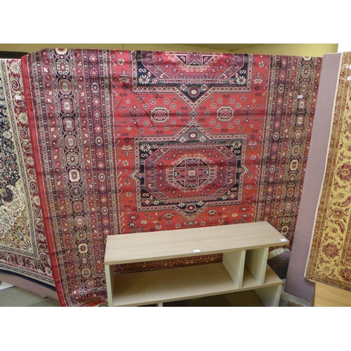 1575 - A rich red ground full pile Cashmere carpet with Beluchi design, 200cm x 300cm