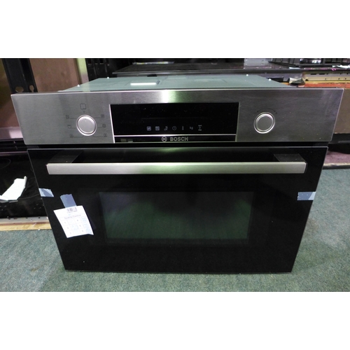 3262 - Bosch Serie 4 Combination Microwave Oven - H454xW595xD570  Model No CMA583MS0B, Original RRP £557.50... 