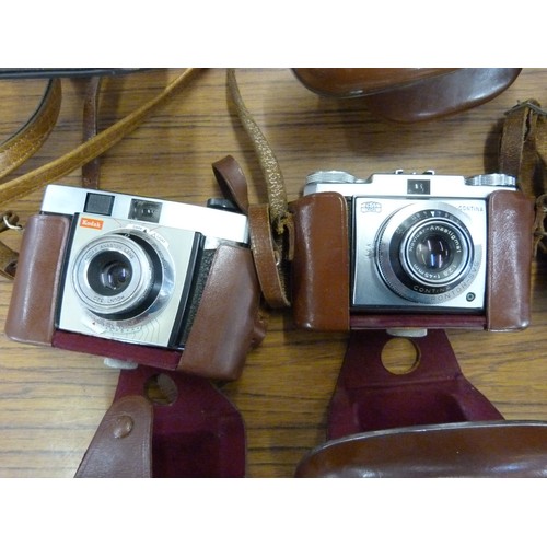 740 - Six cameras including Zeiss Ikon Continette and Contina, Agfa and Kodak, 35mm, all with leather case... 