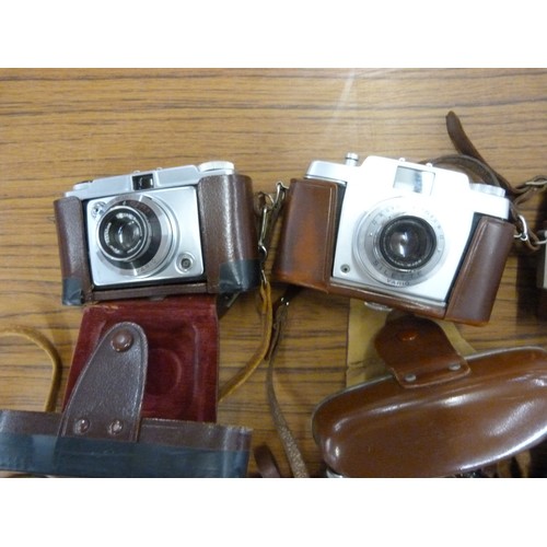 740 - Six cameras including Zeiss Ikon Continette and Contina, Agfa and Kodak, 35mm, all with leather case... 