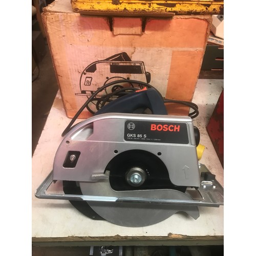 2038 - Bosch breaker drill in case and Bosch circular saw in box