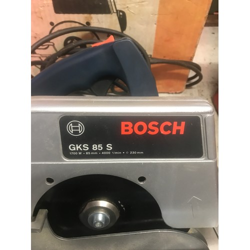 2038 - Bosch breaker drill in case and Bosch circular saw in box