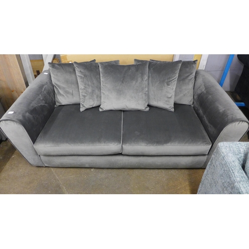 1301 - An ash velvet three seater sofa