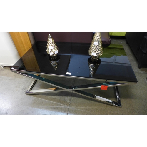 1305 - A chrome and black glass top coffee table