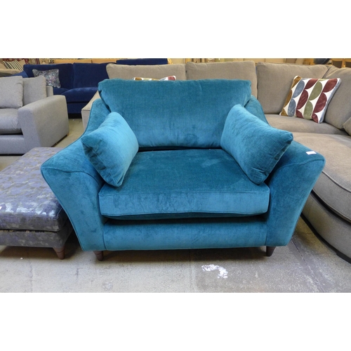 1308 - A turquoise velvet love seat