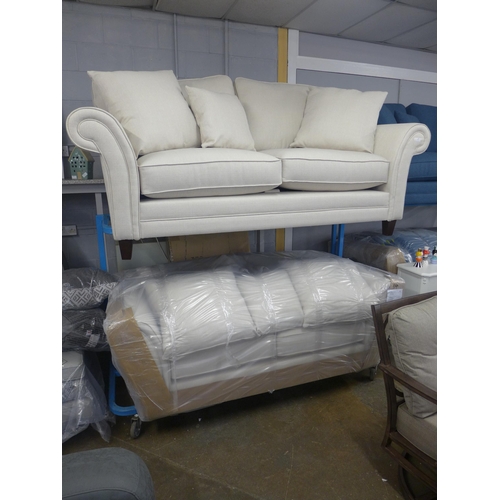 1425 - A pair of Mosta Aosta natural upholstered sofas (3 + 2) - This lot is subject to VAT*