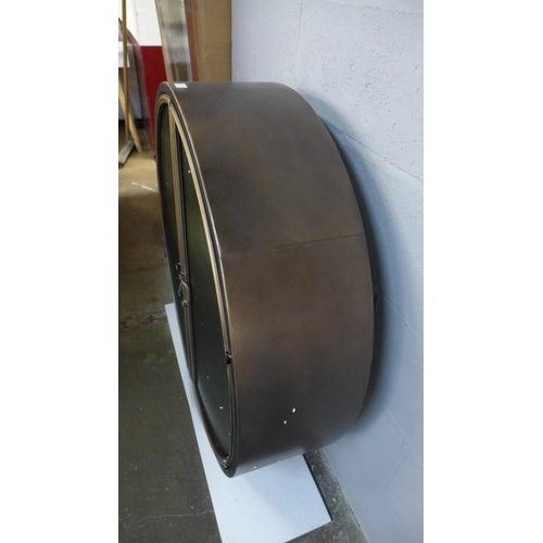 1334 - A circular industrial style wall mounted cabinet